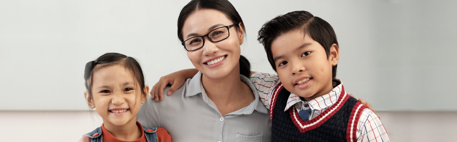 teacher smiling with her students