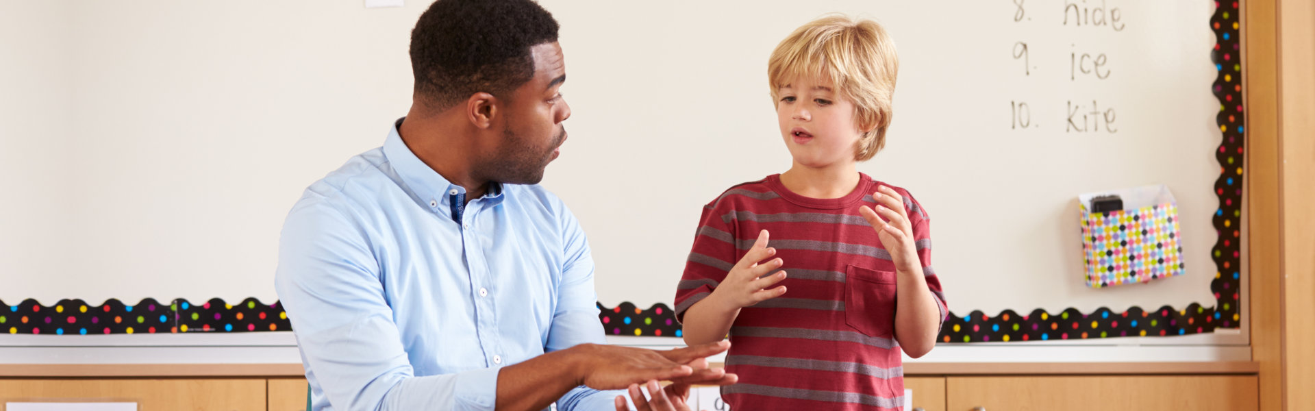 a teacher guiding his student